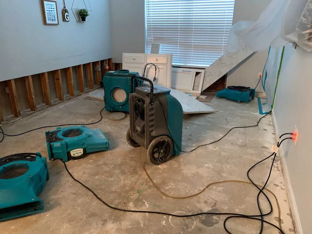 Dehumidifier in flood-cut room for Water Damage Restoration in Wyoming